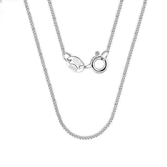 925 Sterling Silver Curb Chain 1mm, showcasing a sleek and elegant design, ideal for layering or wearing alone as a stylish accessory for men